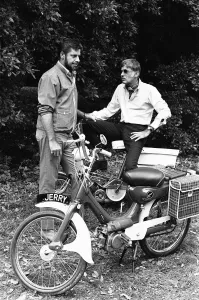 Director Jerry Lewis seen here with Peter Lawford whilst on location at Eastnor Castle