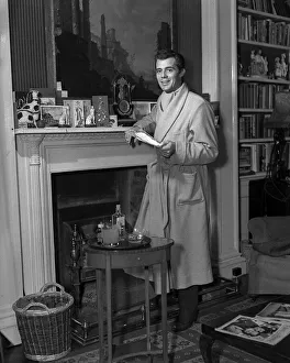 Dirk Bogarde actor convalescing in his home at Ammersham Common after an attack of