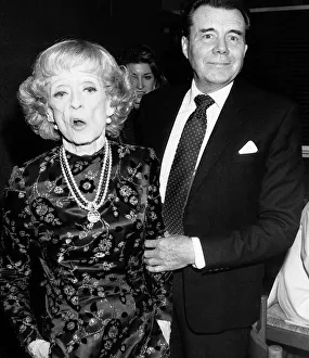 Ties Prints: Dirk Bogarde British actor with actress Bette Davis in September 1987
