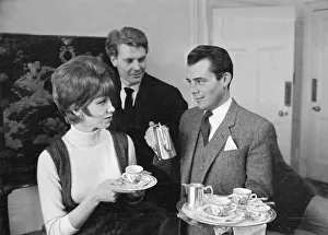Dirk Bogarde with movie stars of the film The Servant - Wendy Craig - during a tea