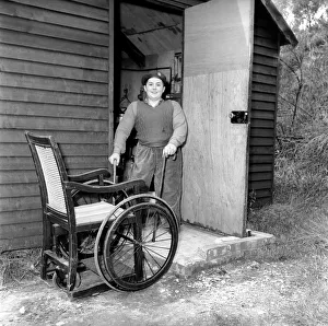 Youth Movement Prints: Disability and Youth: Tommy Hoare the legless boy scout seen here enjoying camping