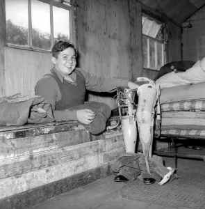 Disability and Youth: Tommy Hoare the legless boy scout seen here enjoying camping