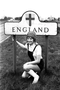 Walking Prints: Disc jockey Jimmy Savile during his 1000 mile charity walk from John o