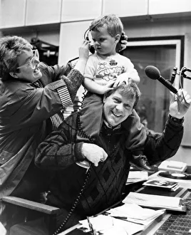 Disc jockey, two year old Paul Clark of Formby takes a ride with Radio