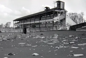 Discarded betting slips and newspapers left over by punters after a day at the races