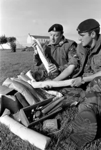 Dismantled Bomb. Members of Royal Army Ordanance Corps with Dismantled 50lb Bomb