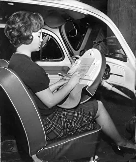 Motoring Prints: A dispatch case that unzips to fit over a car steering wheel converting it into a solid