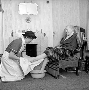 The District Nurse: General scenes of District Nurse Muggeride out on her rounds visit