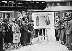 District Officer Coleman explaining the air raid precautions to the members of the Aston