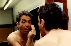DJ Tiger Tim Stevens applies makeup to his face 18th February 1991