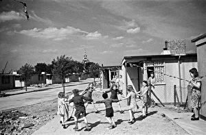 Century Prints: Dockland Houses, Isle of Dogs. Families set up home in pre-fabricated houses, Circa 1946