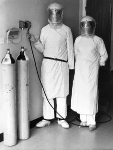 Nurses Prints: Doctors and nurses wearing protective clothing against Lassa Fever at Newcastle General