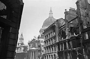 01491 Prints: The dome of St Pauls Cathedral looms over the devastated remains of Cannon Street