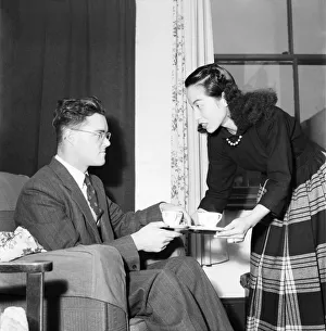 Domestic Scenes Man and Wife. A woman bringing her husband a cup of tea February