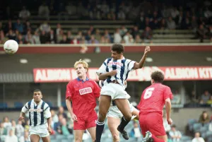 00432 Prints: Don Goodman of West Bromwich Albion heads for goal but Shrewsbury Town goalkeeper ken