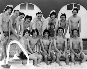 Swimming Trunks Prints: Don Revie England football manager seen here with the national team beside the pool