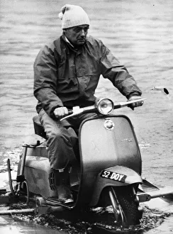 Scooter Prints: Donald Campbell rides a water scooter on Coniston Water in 1966