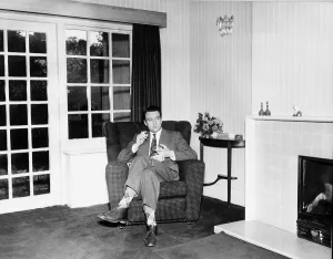 Suits And Jackets Prints: Donald Sinden film actor sitting in his chair at home smoking a cigarette 1959