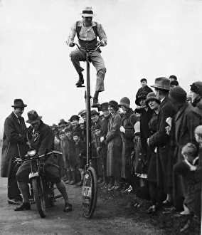 Stuntman Prints: Doncaster Infirmary Appeal October 1925 A student on a tall unicycle attempts to
