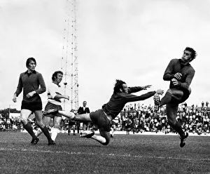 00349 Prints: Doncaster v Stoke. Doncaster keeper Len Johnson beats Geoff Hurst. July 1972 P001642