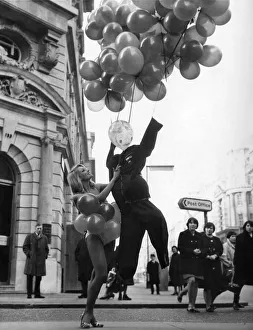 00050 Prints: Donna the balloon girl launches a most unusual low-Flying aircraft