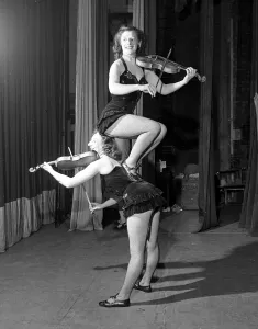 Trick Prints: Dorina and Gina Benedette - Acrobatic Dancers / Violinist December 1951