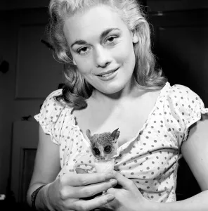 Dorinda Stevens seen here with her pet Bush Baby. 1959