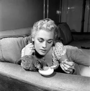 Dorinda Stevens seen here with her pet Bush Baby. 1959
