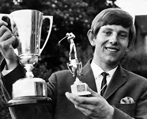 Doug McClelland, proudly holds The Journal Trophy which he keeps for a year