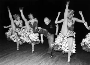 High Kick Prints: Doug Trendle aka Buster Bloodvessel finds it rather hard work keeping up with the girls