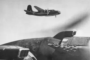 Flying Prints: A Douglas Boston 111 in flight. (background) (serial letter F
