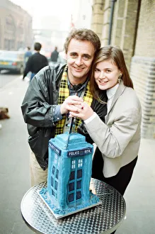 00284 Prints: Dr Who, Sylvester McCoy with his assistant Ace alias Sophie Aldred cutting a cake in