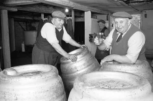 A Drayman samples the beer during a break in work at the Donnington Brewery 5th July