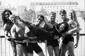 The Dreamboys who are strippers pose with Lesley Joseph Actress to promote Telethon 92