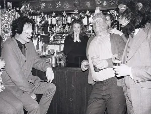 Core23 Prints: Drinkers standing at the bar of the Red Lion in Kings Langley Hertfordshire wearing masks
