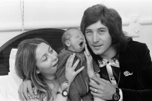 00450 Prints: Drummer Kenney Jones of the Faces pop group with his wife Jan at the Welbeck Street