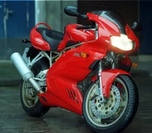Ducati Prints: DUCATI 900ss January 1999 Healdlight fairing exhaust derilled brake disc motorcycle