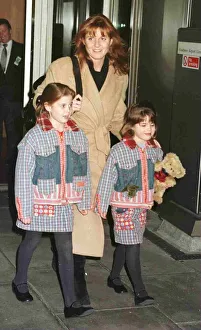 Duchess Of York and children Princess Beatrice and Princess Eugenie leave Heathrow for