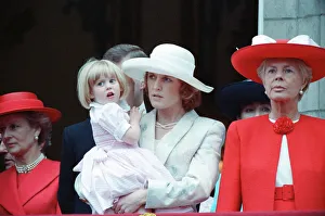 The Duchess of York, Sarah Ferguson, holds her three year old daughter Princess Beatrice