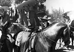Mexico Prints: The Duke of Edinburgh in the costume of a Cowboy, when he broke his nine-day tour of
