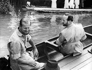 Ne022 Prints: The Duke of Edinburgh Feb 1957 and Lt. Commander Michael Parker in a canoe at Gambia