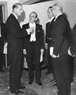 The Duke Of Edinburgh at a formal dinner talking with members of the French Chamber of