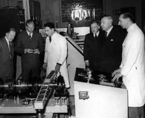 Laboratories Prints: The Duke of Edinburgh inspects a machine for load-testing splines in the laboratory of