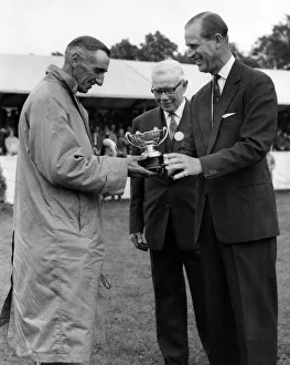 The Duke of Edinburgh presents Mr Tom Leedham of Lancashire with the Waddilove (Shepherds