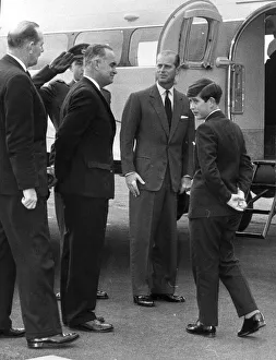 Aeroplane Prints: The Duke of Edinburgh with Prince Charles as he leaves to start his first day of school