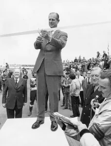 01427 Prints: The Duke of Edinburgh. Prince Philip opens a Motor racing event. April 1975