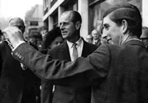 01417 Prints: The Duke of Edinburgh. Prince Philip & Prince Charles pictured just after a smoke bomb