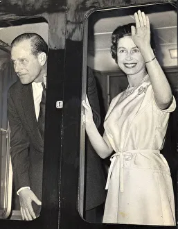 01440 Prints: The Duke of Edinburgh, Prince Phillip and Queen Elizabeth II wave to the crowds as they