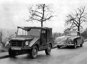 01440 Prints: The Duke of Edinburgh. Prince Phillips Aston Martin Lagonda being towed