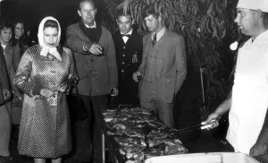 THE DUKE OF EDINBURGH. QUEEN ELIZABETH II AND PRINCE PHILIP ATTEND A BARBEQUE